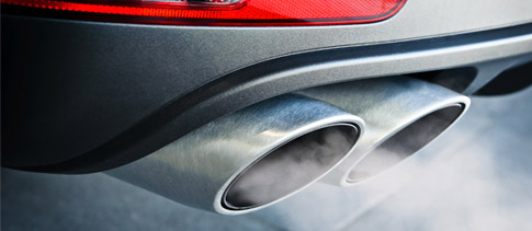 Car exhaust with emissions