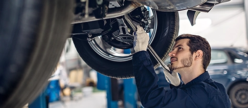 Newtown Garage technician at work on a car